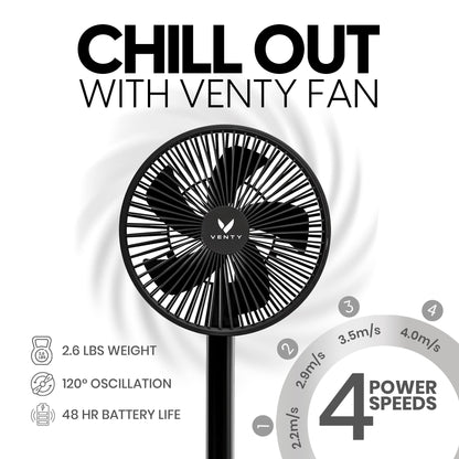 Black fan extended on table